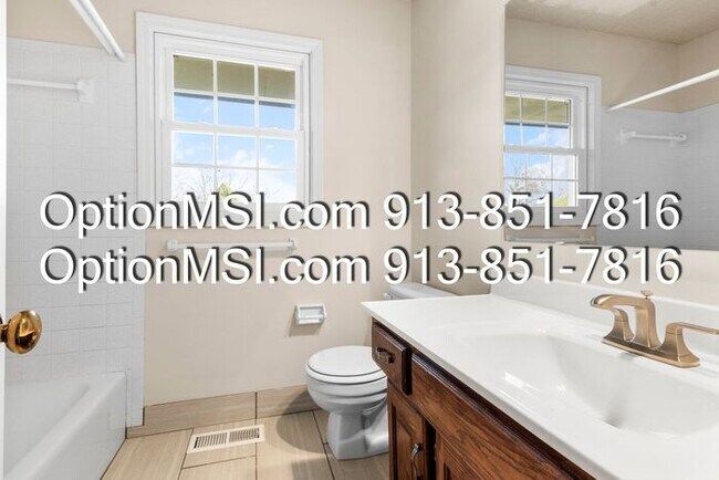 Building Photo - Welcome home to this charming two-story in South Woods subdivision