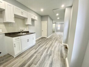 Building Photo - Three-Bedroom Home with a Private Back Patio