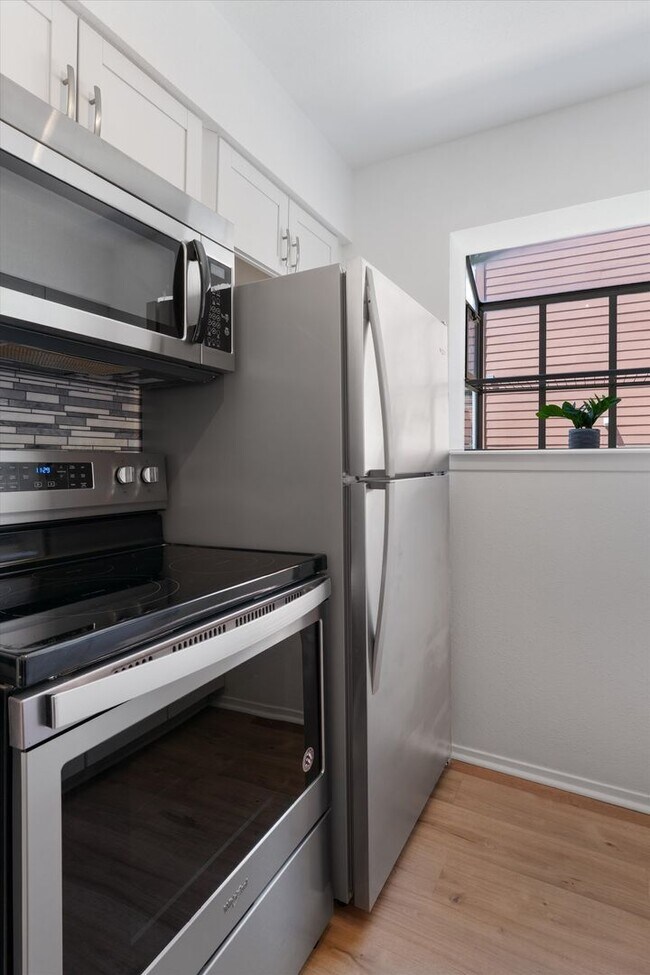 Building Photo - Perfectly Located 1-Bedroom Condo For Lease