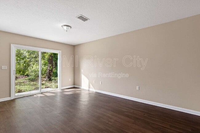 Building Photo - 7608 Rain Forest Dr N