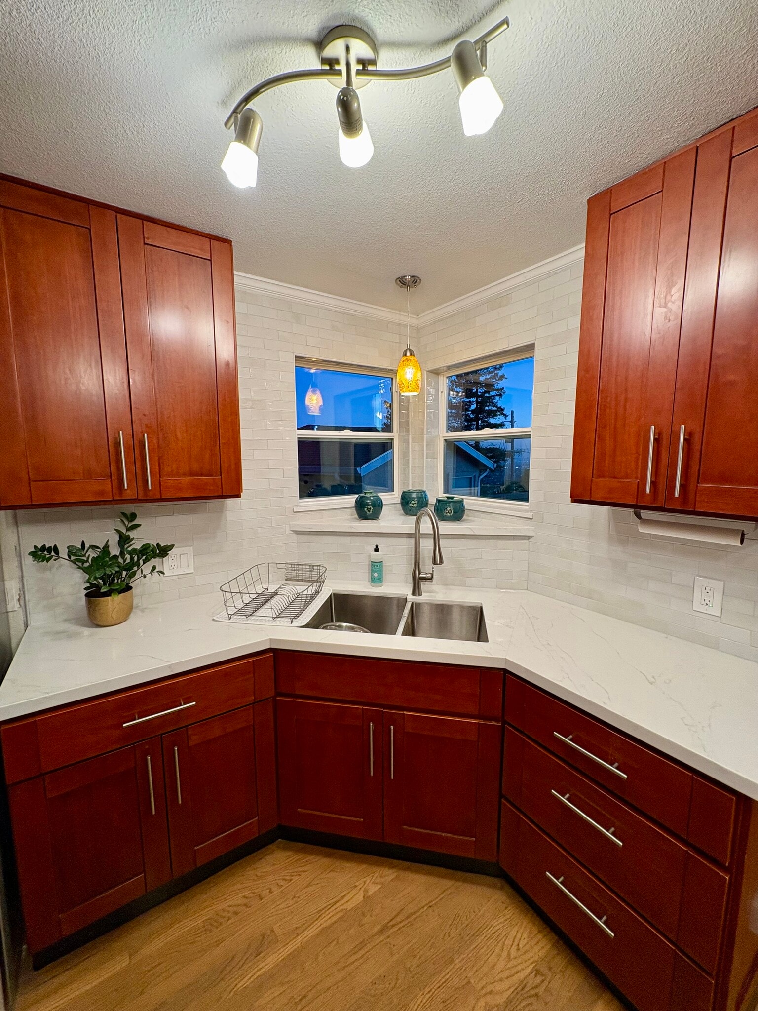 kitchen with brand new countertops and subway tile - 7872 Michigan Ave