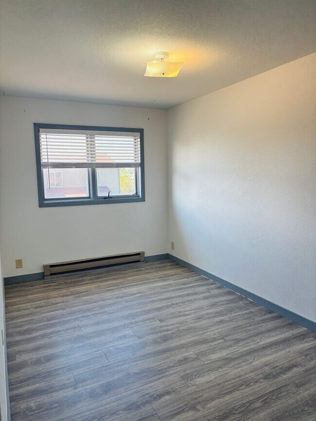 Building Photo - Renovated 3BR condo w/ garage & private yard **MOVE IN SPECIAL - See details below**