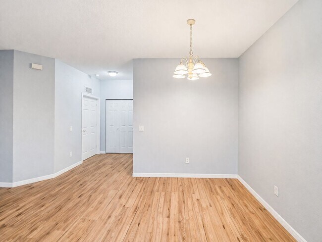 Building Photo - Annual 2/2 Condo with Flex Room in River Preserve Featuring Community Pool