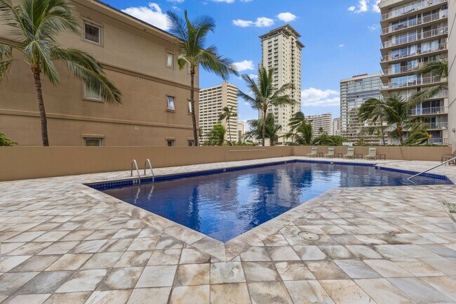 Building Photo - Wake Up to Stunning Mountain & Ala Wai Canal Views in the Heart of Waikiki