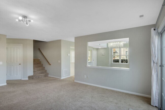 Building Photo - Updated 3-Bed, 2.5-Bath Yorktown Condo with Modern Kitchen, Parking & Community Amenities