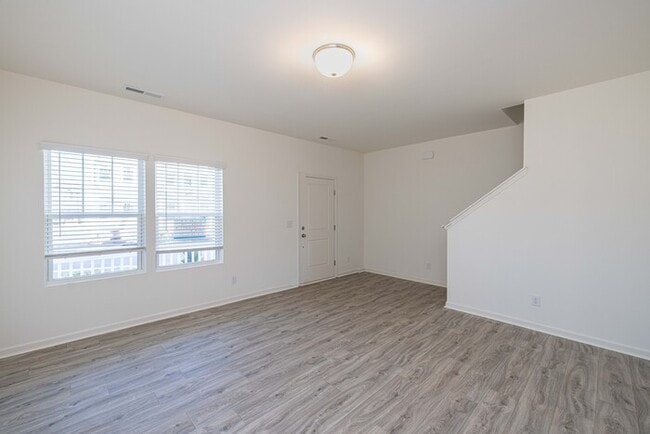 Building Photo - Three bedroom 2 1/2 bath corner unit townh...