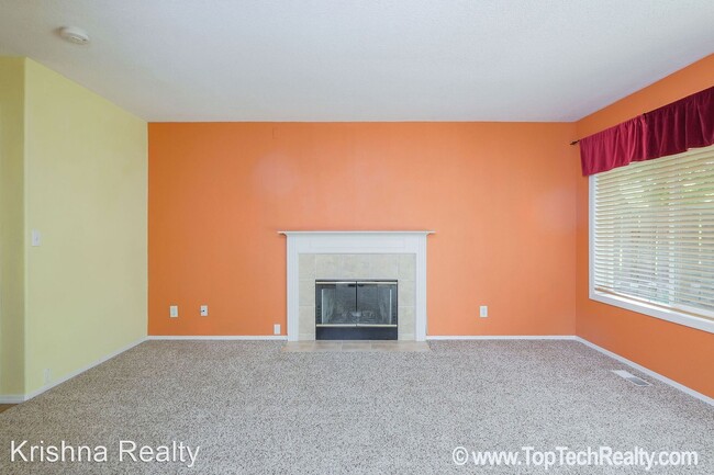 Building Photo - 4 br, 2.5 bath House - 5910 NW Snowlily Dr