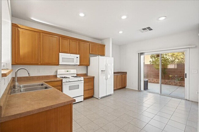 Building Photo - Elegant 3 Bedroom Home with Gourmet Kitchen, Office, & Landscaped Backyard