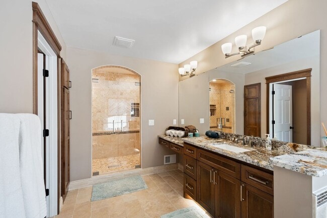 Building Photo - Executive-Level Rental Offering in SW Woodbury — Space, Privacy & High-End Finishes