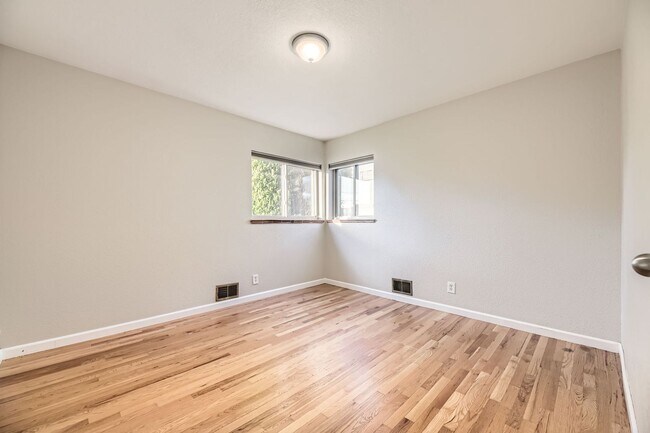 Building Photo - Spacious Home w/Large Backyard Only Blocks...