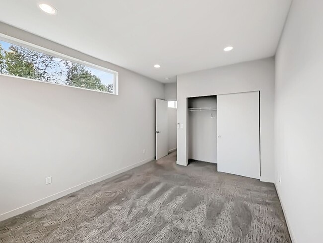 Building Photo - Stunning Two-Bedroom Townhome with Rooftop...