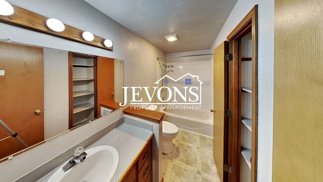 Building Photo - Enjoy this 3-bedroom home featuring a fully equipped kitchen, a two-car attached garage, and a fe...