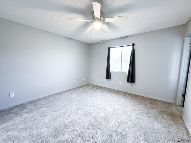 Building Photo - 8558 E 38th Ln