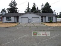 Building Photo - Green-Parkland Duplex