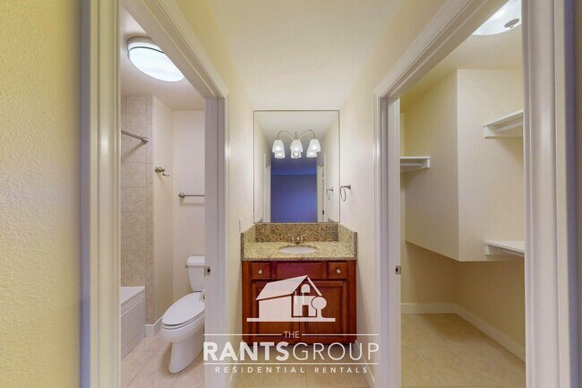 Building Photo - Meticulously Updated Townhome in Gated Community – Low Maintenance & Move-In Ready!