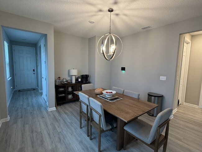 Building Photo - Spacious & Modern Layout – Perfect for Ent...