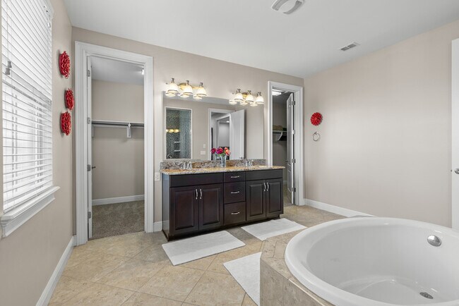 Building Photo - Luxury Waterfront Pool Home in Laureate Park | 4BR + Water Views