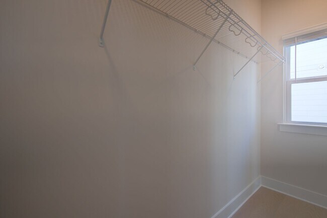 Building Photo - COMING SOON! Modern End-Unit Living Near Uptown | Rooftop Terrace + Tandem Garage