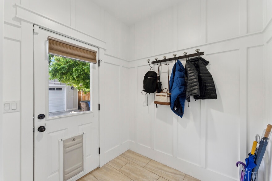 coat area, back entrance to yard and garage - 1044 E Wood Ave