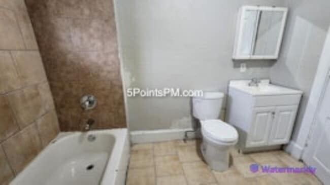 Building Photo - 9804 Miles Ave