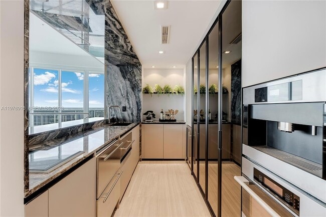 Building Photo - 18201 Collins Ave