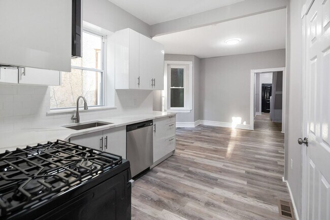 Primary Photo - Renovated 4-Bedroom Home with Modern Finishes
