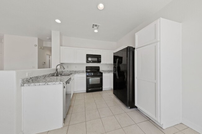 Building Photo - Charming 3-Bedroom Home in Gated North Las...