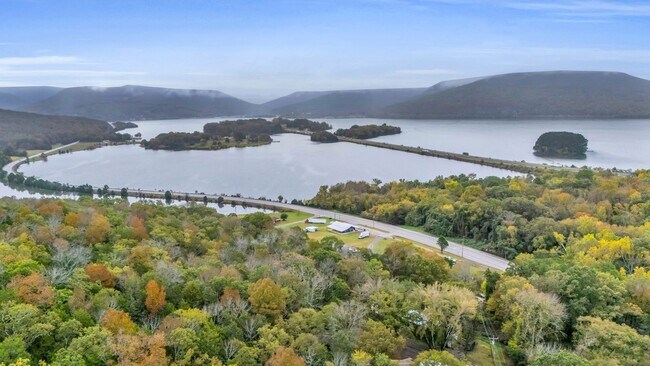 Building Photo - Retreat Like Feel + Practically New! 4 Beds, 3 Baths, Over 2,000 Sq Ft. with Glimpses of Nickajac...