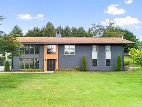 Building Photo - Renovated Mid-Century Modern Home in Belmont West with Finished Basement & Fenced Yard