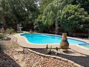 Building Photo - 3/2 w/pool in private garden