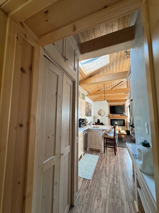 Hall connecting bedroom to open floor plan. - 1134 Stanford St