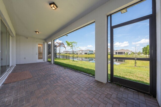 Building Photo - Immaculate Executive Home in Isles of Lake Nona