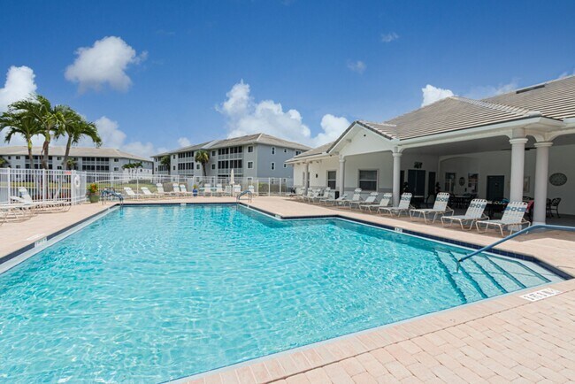 Building Photo - AVAILABLE NOW! Top-Floor Condo | Gated Community | Preserve Views | Water, Sewer & Cable Included