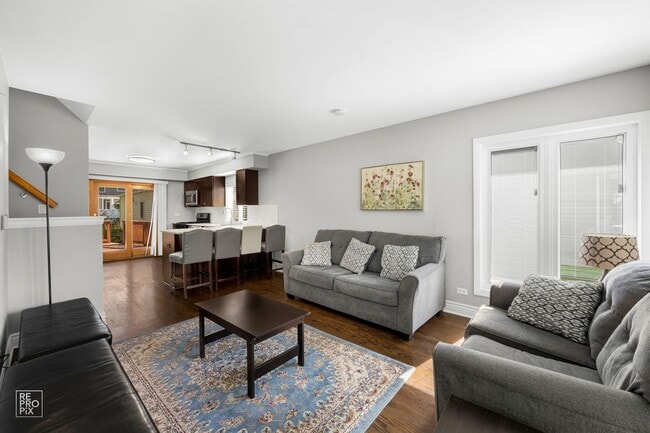 Building Photo - Elmhurst Three Bedroom Home with Fenced Yard and Detached Garage