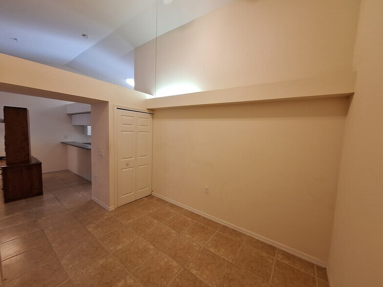 Den has storage closet, ledges for decorations or storage - 25727 Lake Amelia Way
