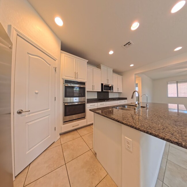 Building Photo - Exceptional Dual Master Residence with Modern Upgrades