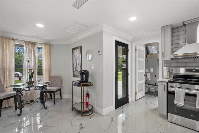 Building Photo - 3-Bedroom Punta Gorda Retreat with Marble Finishes & Stylish Furnishings!"