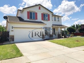 Building Photo - 4 bedroom, 2 ½ bath SOLAR home