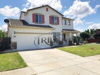 Building Photo - 4 bedroom, 2 ½ bath SOLAR home