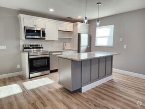 Building Photo - Magnificent 1 bedroom, 1.5 bathroom condo ...
