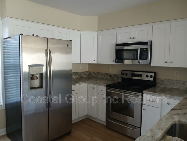 Building Photo - 8550 Tidewater Dr