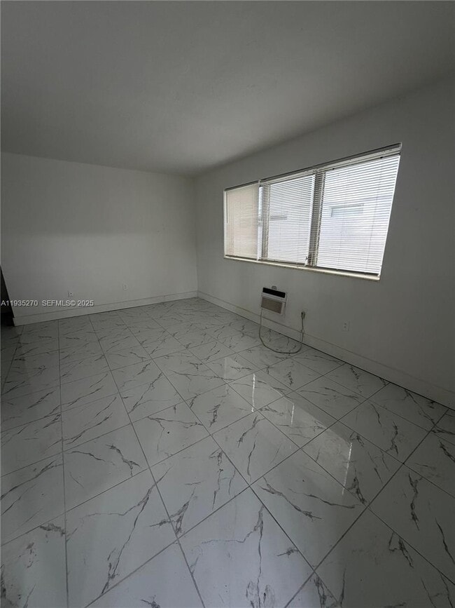 Building Photo - 7730 Dickens Ave