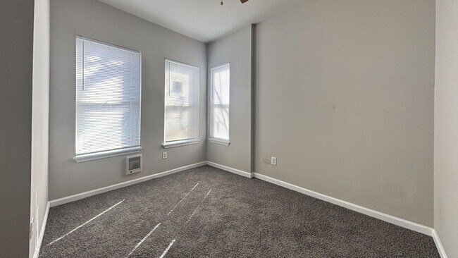 Building Photo - Move-In Ready 3-Bedroom Home with Stylish Hardwood-Style Flooring