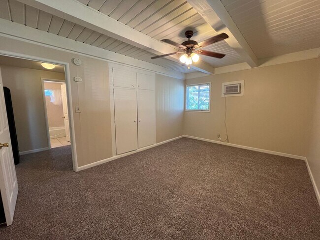 Building Photo - 2 bed 1 bath single family home with back yard and garage space