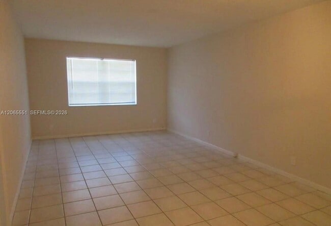 Building Photo - 10751 Royal Palm Blvd
