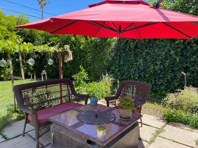 Back yard with grape arbor - 1344 S Curson Ave