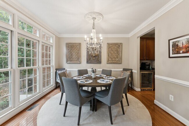 Building Photo - Discover this stunning four-level townhous...