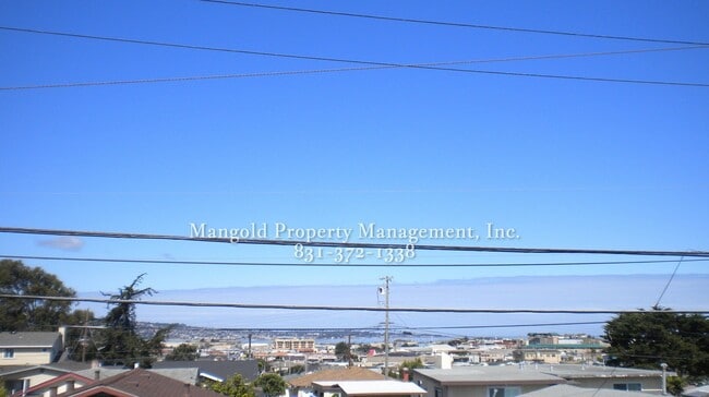 Building Photo - Charming Two-Story 2-Bed 2-Bath Home with Wrap-Around Balcony & Hardwood Floors in Seaside