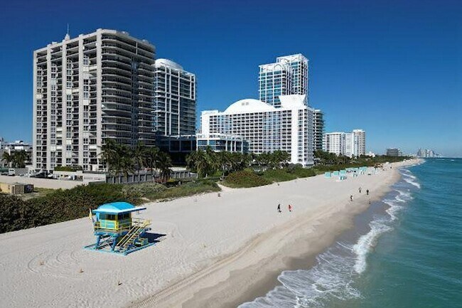 Building Photo - 6767 Collins Ave