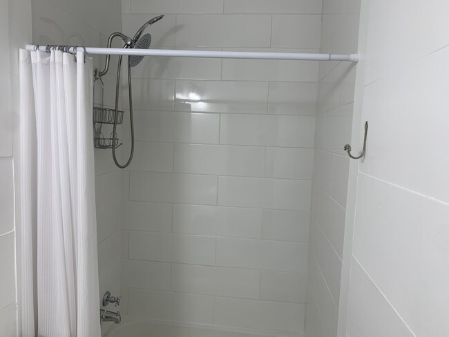 Double shower head. - 322 E 19th St